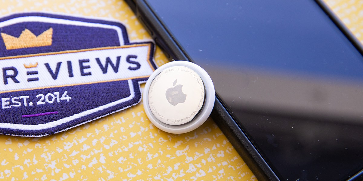 Apple AirTag next to phone