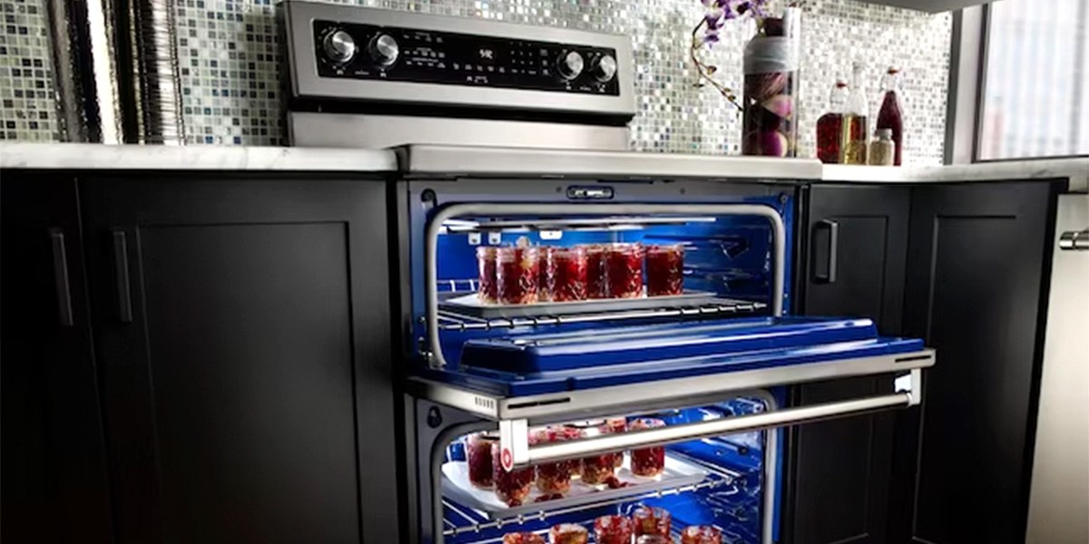  KitchenAid Self-Cleaning Freestanding Double Oven Electric Convection Range with doors open
