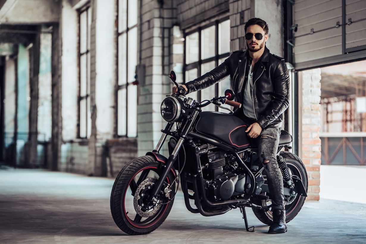 a man in motorcycle glasses