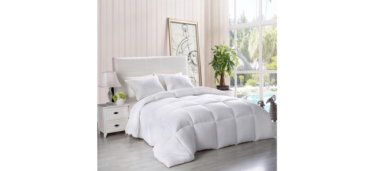 White Utopia Bedding All-Season Comforter on bed