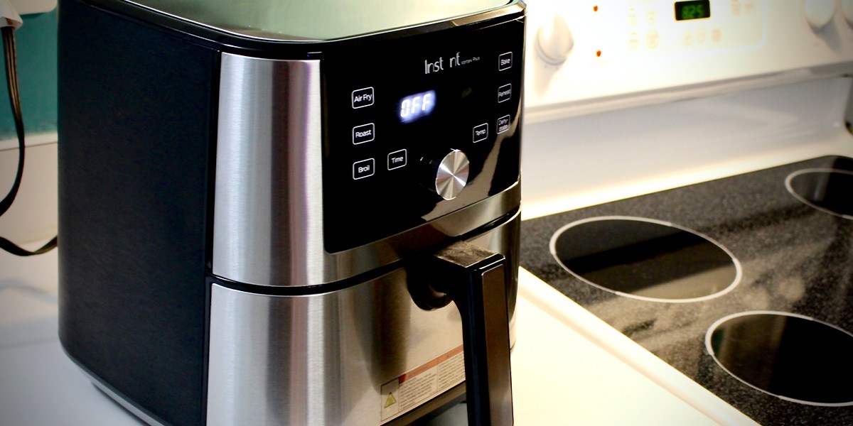 Image of Instant Vortex Plus on countertop next to stovetop Image of Instant Vortex Plus on countertop next to stovetop