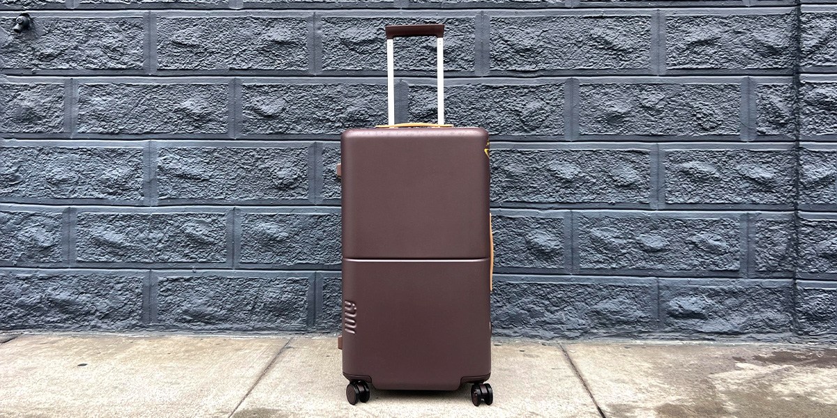 July Checked Trunk against a wall July Checked Trunk against a wall