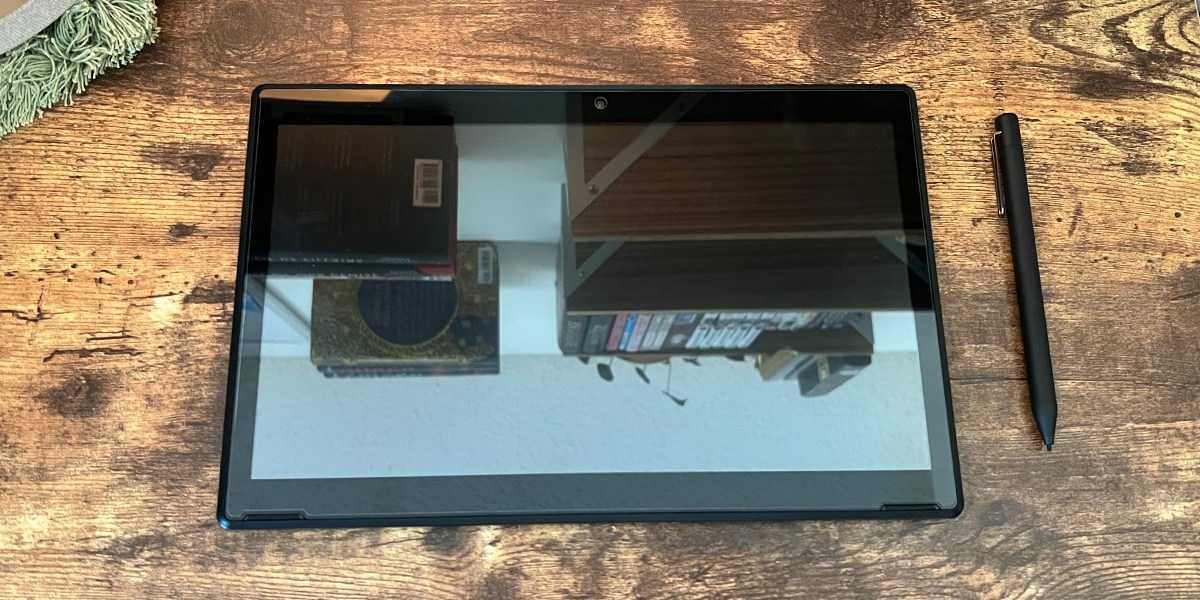 Simbans PicassoTab XL with stylus on wooden background Simbans PicassoTab XL with stylus on wooden background