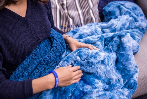 9 cozy sherpa blankets that will keep you warm this winter