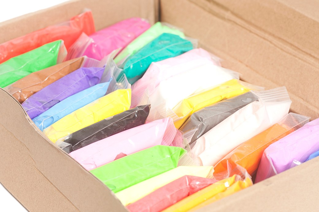 Bricks of polymer clay in box