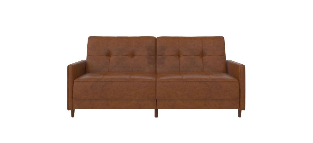 A brown vegan leather two-seater tufted sofa that pulls out into a twin bed