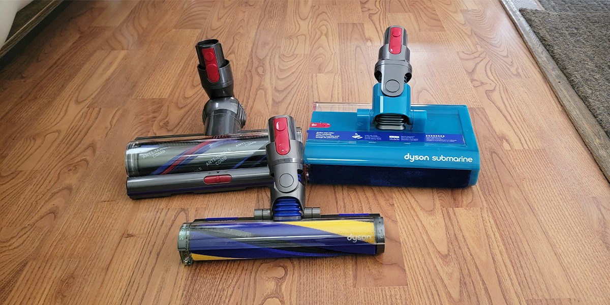 Three different Dyson V15s Detect Submarine brushrolls on wood flooring