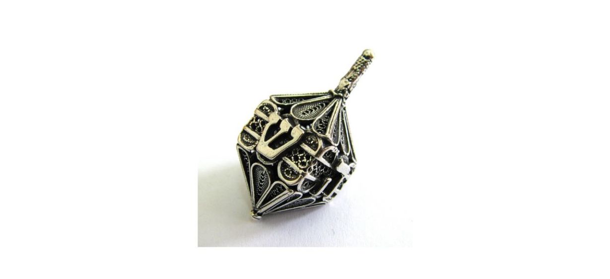 Gersihi Art of Silver Sterling Silver Dreidel on white background